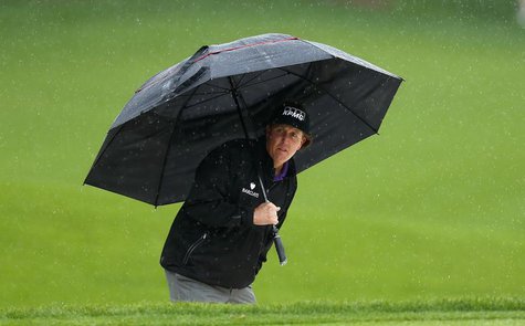 Phil Mickelson of the U.S. reviews his shot from the greenside bunker on the 15th hole during the final round of the Wells Fargo Championshi Phil Mickelson of the U.S. reviews his shot from the greenside bunker on the 15th hole during the final round of the Wells Fargo Championshi