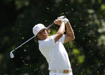 Rickie Fowler of the U.S. hits from the 15th fairway during a practice round for the 2013 U.S. Open golf championship at the Merion Golf Clu Rickie Fowler of the U.S. hits from the 15th fairway during a practice round for the 2013 U.S. Open golf championship at the Merion Golf Clu