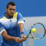 France's Jo-Wilfried Tsonga returns the ball during his men's singles tennis match against his fellow countryman Edouard Roger-Vasselin at t France's Jo-Wilfried Tsonga returns the ball during his men's singles tennis match against his fellow countryman Edouard Roger-Vasselin at t