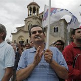Supporters of the communist-affiliated trade union PAME take part in a rally near the headquarters of Greek state broadcaster ERT at Aghia P Supporters of the communist-affiliated trade union PAME take part in a rally near the headquarters of Greek state broadcaster ERT at Aghia P