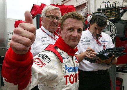 Panasonic Toyota driver Allan McNish of Britain reacts after he clocked the second time of the free practice session of Monaco Formula One G Panasonic Toyota driver Allan McNish of Britain reacts after he clocked the second time of the free practice session of Monaco Formula One G