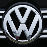 A Volkswagen logo is seen on the front of a Volkswagen vehicle at a dealership in Carlsbad, California, April 29, 2013. REUTERS/Mike Blake