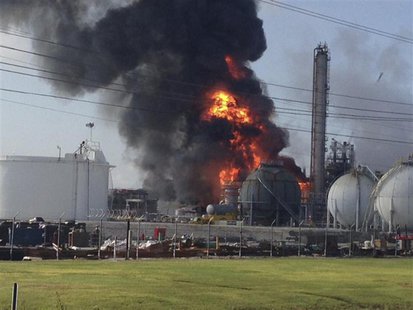 A large fire burns at the Williams Olefins chemical plant in Geismar, Louisiana in this picture taken June 13, 2013. REUTERS/Picture courtes A large fire burns at the Williams Olefins chemical plant in Geismar, Louisiana in this picture taken June 13, 2013. REUTERS/Picture courtes