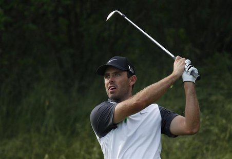 South Africa's Charl Schwartzel tees off on the 13th hole during a practice round for the 2013 U.S. Open golf championship at the Merion Gol South Africa's Charl Schwartzel tees off on the 13th hole during a practice round for the 2013 U.S. Open golf championship at the Merion Gol