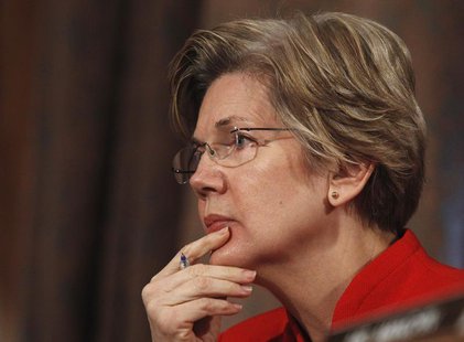 Senator Elizabeth Warren (D-MA) listens to answers during a testimony while sitting on the Senate Banking, Housing and Urban Affairs Committ Senator Elizabeth Warren (D-MA) listens to answers during a testimony while sitting on the Senate Banking, Housing and Urban Affairs Committ