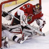Pittsburgh Penguins' Evgeni Malkin slides into the net past Ottawa Senators goalie Craig Anderson during the first period in Game 3 of their Pittsburgh Penguins' Evgeni Malkin slides into the net past Ottawa Senators goalie Craig Anderson during the first period in Game 3 of their
