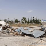 Barricades are seen on a street in Aleppo's countryside, June 13, 2013. REUTERS/George Ourfalian Barricades are seen on a street in Aleppo's countryside, June 13, 2013. REUTERS/George Ourfalian