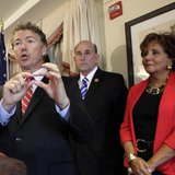 Senator Rand Paul (R-KY) gestures during a news conference to announce legal action against government surveillance and the National Securit