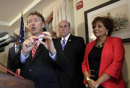 Senator Rand Paul (R-KY) gestures during a news conference to announce legal action against government surveillance and the National Securit Senator Rand Paul (R-KY) gestures during a news conference to announce legal action against government surveillance and the National Securit