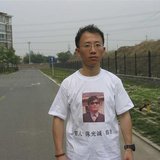 One of China's most prominent dissidents, Hu Jia, wears a shirt in support of blind Chinese lawyer Chen Guangcheng, in this undated file han One of China's most prominent dissidents, Hu Jia, wears a shirt in support of blind Chinese lawyer Chen Guangcheng, in this undated file han