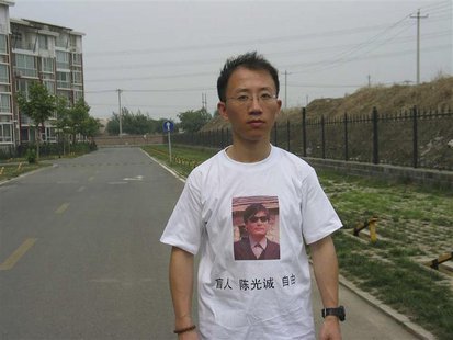 One of China's most prominent dissidents, Hu Jia, wears a shirt in support of blind Chinese lawyer Chen Guangcheng, in this undated file han One of China's most prominent dissidents, Hu Jia, wears a shirt in support of blind Chinese lawyer Chen Guangcheng, in this undated file han