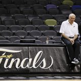 San Antonio Spurs coach Gregg Popovich (L) sits with player Tony Parker, who injured his hamstring during Game 3, during practice for their San Antonio Spurs coach Gregg Popovich (L) sits with player Tony Parker, who injured his hamstring during Game 3, during practice for their