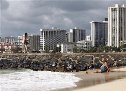Beachgoers are pictured at Waikiki Beach in Honolulu, Hawaii November 9, 2011. (Credit: Reuters/Chris Wattie) Beachgoers are pictured at Waikiki Beach in Honolulu, Hawaii November 9, 2011. (Credit: Reuters/Chris Wattie)