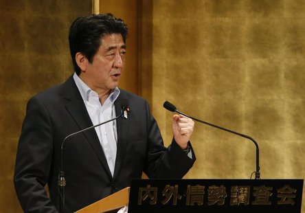 Japan's Prime Minister Shinzo Abe gestures as he delivers a speech at a seminar in Tokyo June 5, 2013. REUTERS/Toru Hanai Japan's Prime Minister Shinzo Abe gestures as he delivers a speech at a seminar in Tokyo June 5, 2013. REUTERS/Toru Hanai