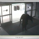 John Zawahri, a suspected gunman, enters the library at Santa Monica City College during the June 7, 2013 shooting incident in this handout 