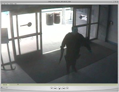 John Zawahri, a suspected gunman, enters the library at Santa Monica City College during the June 7, 2013 shooting incident in this handout John Zawahri, a suspected gunman, enters the library at Santa Monica City College during the June 7, 2013 shooting incident in this handout