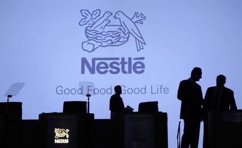 Members of the management of Swiss food maker Nestle arrive for the company's annual general meeting in Lausanne April 11, 2013. REUTERS/Den Members of the management of Swiss food maker Nestle arrive for the company's annual general meeting in Lausanne April 11, 2013. REUTERS/Den
