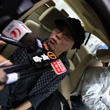 Liu Xia, wife of jailed Nobel Peace Prize Laureate Liu Xiaobo, talks to journalists after a trial outside a court in the Huairou district of