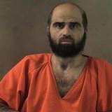 Nidal Hasan, charged with killing 13 people and wounding 31 in a November 2009 shooting spree at Fort Hood, Texas, is pictured in an undated