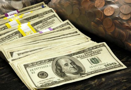 U.S. currency and coins in a vault at a bank in Westminster, Colorado November 3, 2009. REUTERS/Rick Wilking U.S. currency and coins in a vault at a bank in Westminster, Colorado November 3, 2009. REUTERS/Rick Wilking
