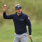 England's Luke Donald reacts to applause on the 17th green during the weather delayed first round of the 2013 U.S. REUTERS/Adam Hunger