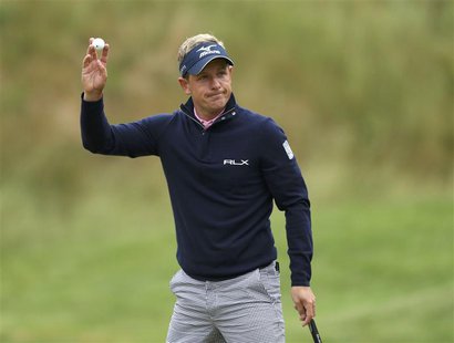 England's Luke Donald reacts to applause on the 17th green during the weather delayed first round of the 2013 U.S. REUTERS/Adam Hunger England's Luke Donald reacts to applause on the 17th green during the weather delayed first round of the 2013 U.S. REUTERS/Adam Hunger