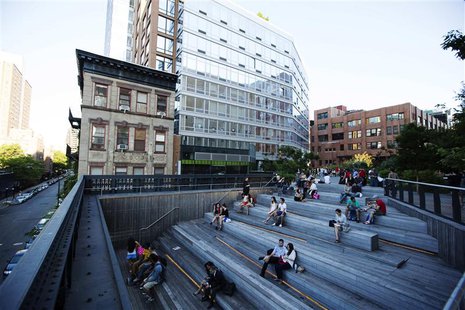 Pedestrians sit in a viewing area on the High Line park in New York, June 12, 2013. REUTERS/Lucas Jackson Pedestrians sit in a viewing area on the High Line park in New York, June 12, 2013. REUTERS/Lucas Jackson