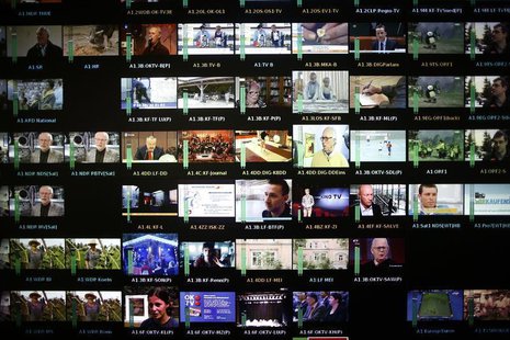 A monitor wall is pictured at Germany's biggest cable operator, Kabel Deutschland, at the playout center in Frankfurt February 25, 2013. REU A monitor wall is pictured at Germany's biggest cable operator, Kabel Deutschland, at the playout center in Frankfurt February 25, 2013. REU