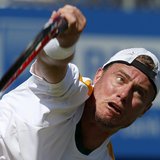 Australia's Lleyton Hewitt serves during his men's singles tennis match against Argentina's Juan Martin Del Potro at the Queen's Club Champi