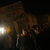Hungarians attend a demonstration after parliament voted for government-backed constitutional amendments, in Budapest March 11, 2013. REUTER