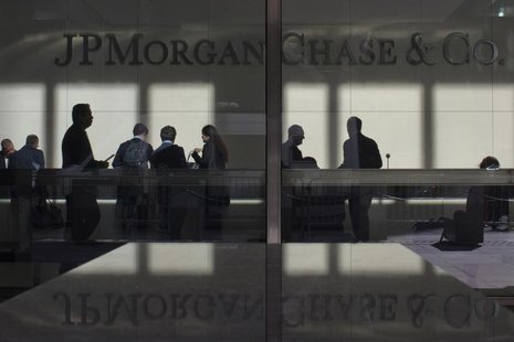 The lobby of JP Morgan headquarters is photographed through it's front doors in New York May 11, 2012. REUTERS/Eduardo Munoz The lobby of JP Morgan headquarters is photographed through it's front doors in New York May 11, 2012. REUTERS/Eduardo Munoz
