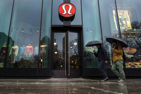 Pedestrians walk past a Lululemon Athletica store in New York, March 19, 2013. REUTERS/Lucas Jackson Pedestrians walk past a Lululemon Athletica store in New York, March 19, 2013. REUTERS/Lucas Jackson
