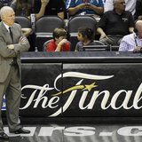 San Antonio Spurs head coach Gregg Popovich watches his team play the Miami Heat during the fourth quarter in Game 4 of their NBA Finals bas