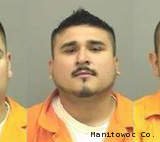 From left to right: Julian Perez Jr., Alfredo Hernandez-Benitez and Joe Alvarez-Gonzales. (courtesy of the Manitowoc County Sheriff's Dept.) From left to right: Julian Perez Jr., Alfredo Hernandez-Benitez and Joe Alvarez-Gonzales. (courtesy of the Manitowoc County Sheriff's Dept.)