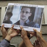 Protesters supporting Edward Snowden, a contractor at the National Security Agency (NSA), hold a photo of Snowden during a demonstration outside the U.S. Consulate in Hong Kong June 13, 2013.
Credit: Reuters/Bobby Yip Protesters supporting Edward Snowden, a contractor at the National Security Agency (NSA), hold a photo of Snowden during a demonstration outside the U.S. Consulate in Hong Kong June 13, 2013.
Credit: Reuters/Bobby Yip