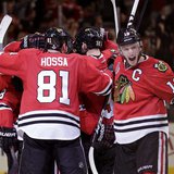 Chicago Blackhawks center Jonathan Toews (19) celebrates with his team after they defeated the Boston Bruins in triple-overtime in Game 1 of Chicago Blackhawks center Jonathan Toews (19) celebrates with his team after they defeated the Boston Bruins in triple-overtime in Game 1 of