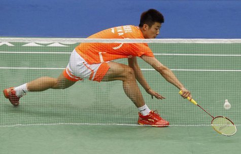 China's Chen Long plays against China's Du Pengyu (not pictured) during their men's singles finals of the Badminton Asia Championships in Ta China's Chen Long plays against China's Du Pengyu (not pictured) during their men's singles finals of the Badminton Asia Championships in Ta