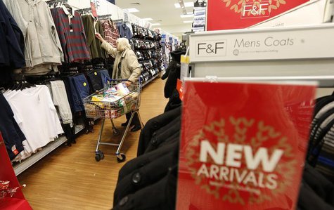 A customer shops for clothing at a Tesco shop in Bishop's Stortford, southern England November 26, 2012. REUTERS/Suzanne Plunkett A customer shops for clothing at a Tesco shop in Bishop's Stortford, southern England November 26, 2012. REUTERS/Suzanne Plunkett