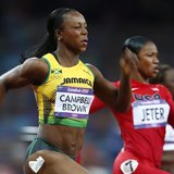 Jamaica's Veronica Campbell-Brown (L) finishes first in her women's 200m semi-final ahead of Carmelita Jeter of the U.S. during the London 2