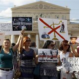 Supporters of sacked Bolshoi ballet star Nikolai Tsiskaridze hold placards demanding his return to the theatre during a sanctioned picket ou