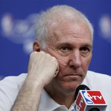San Antonio Spurs coach Gregg Popovich listens to a media question after practice for their NBA Finals basketball playoff series against the San Antonio Spurs coach Gregg Popovich listens to a media question after practice for their NBA Finals basketball playoff series against the