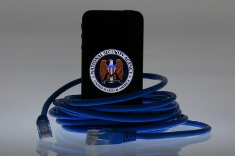 An illustration picture shows the logo of the U.S. National Security Agency on the display of an iPhone in Berlin, June 7, 2013. REUTERS/Paw An illustration picture shows the logo of the U.S. National Security Agency on the display of an iPhone in Berlin, June 7, 2013. REUTERS/Paw