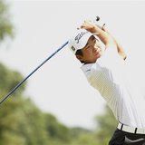 Amateur Michael Kim of the U.S. tees off on the second hole during the third round of the 2013 U.S. Open golf championship at the Merion Gol