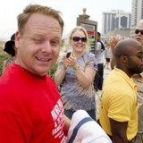 Tightrope walker Nik Wallenda winks as he exits the beach after walking a high wire over the California Avenue beach in Atlantic City, New J