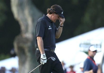 Phil Mickelson of the U.S. walks to the 18th green during the final round of the 2013 U.S. Open golf championship at the Merion Golf Club in Phil Mickelson of the U.S. walks to the 18th green during the final round of the 2013 U.S. Open golf championship at the Merion Golf Club in