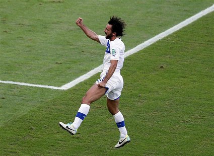 Italy's Andrea Pirlo celebrates after scoring against Mexico during their Confederations Cup Group A soccer match at the Estadio Maracana in Italy's Andrea Pirlo celebrates after scoring against Mexico during their Confederations Cup Group A soccer match at the Estadio Maracana in