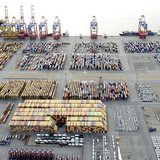 Cars and containers are pictured at a shipping terminal in the harbour of the German northern town of Bremerhaven, late October 8, 2012. REU Cars and containers are pictured at a shipping terminal in the harbour of the German northern town of Bremerhaven, late October 8, 2012. REU