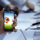 A man holds up Samsung Electronics Co's latest Galaxy S4 phone during its launch at the Radio City Music Hall in New York March 14, 2013. RE A man holds up Samsung Electronics Co's latest Galaxy S4 phone during its launch at the Radio City Music Hall in New York March 14, 2013. RE