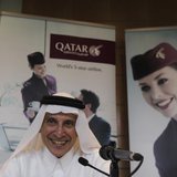 Chief Executive of Qatar Airways Akbar Al Baker laughs during the Arabian Travel Market at Dubai International Convention and Exhibition Cen