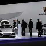 Shareholders watch Porsche cars during the annual shareholders meeting of Porsche in Leipzig, April 30, 2013. REUTERS/Fabrizio Bensch